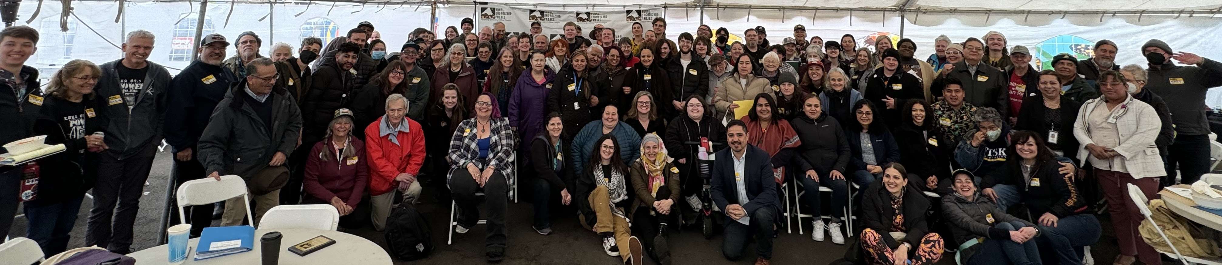 Around 150 gather for a group shot.